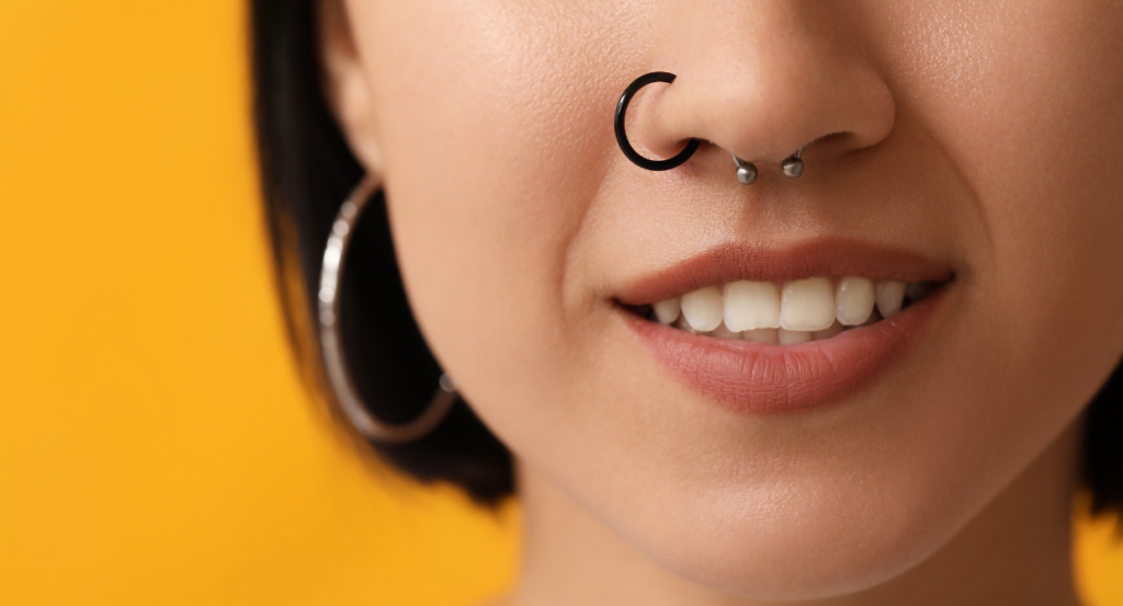 Teen with nose and ear piercing