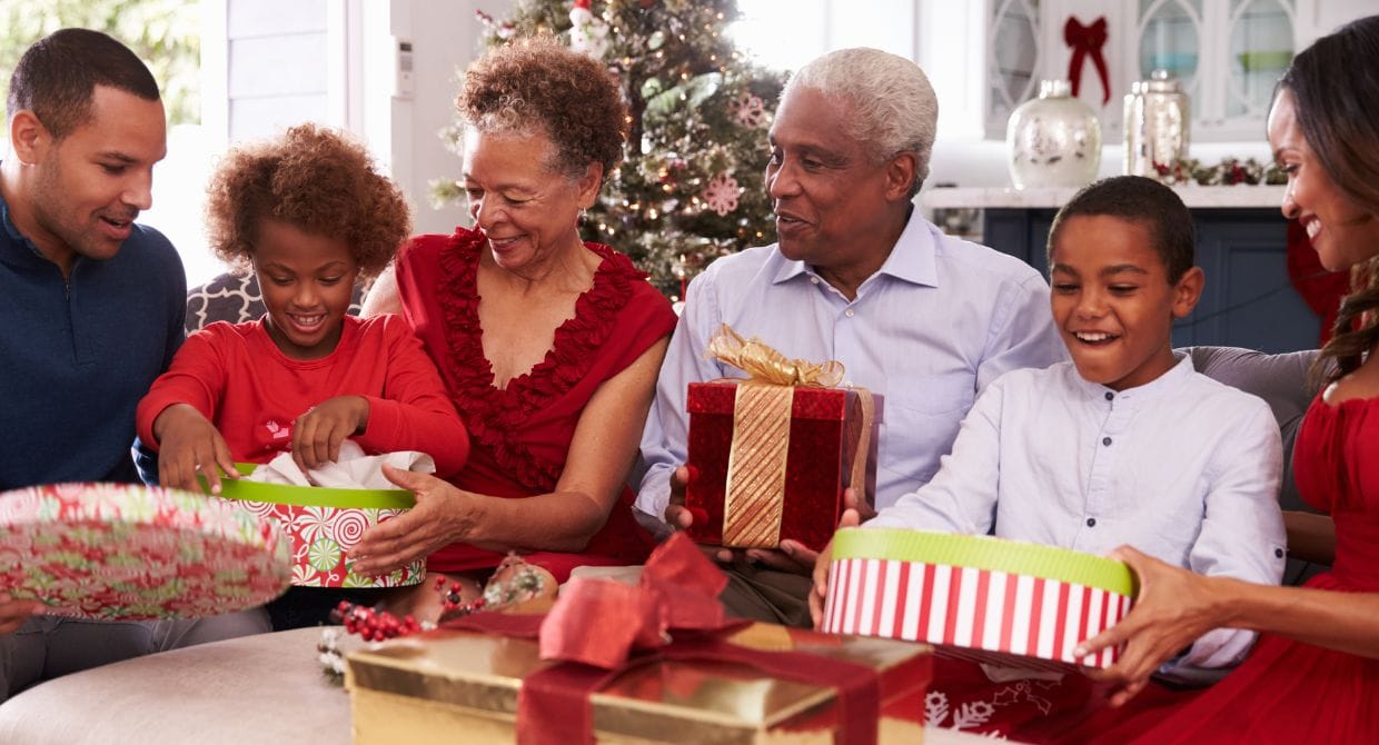 Family opening gifts together