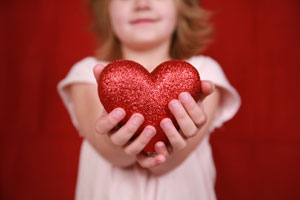 girl-holding-heart